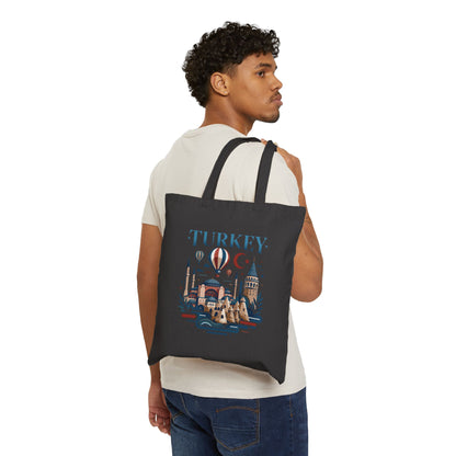 Black canvas tote bag with Turkey graphic print, worn over the shoulder