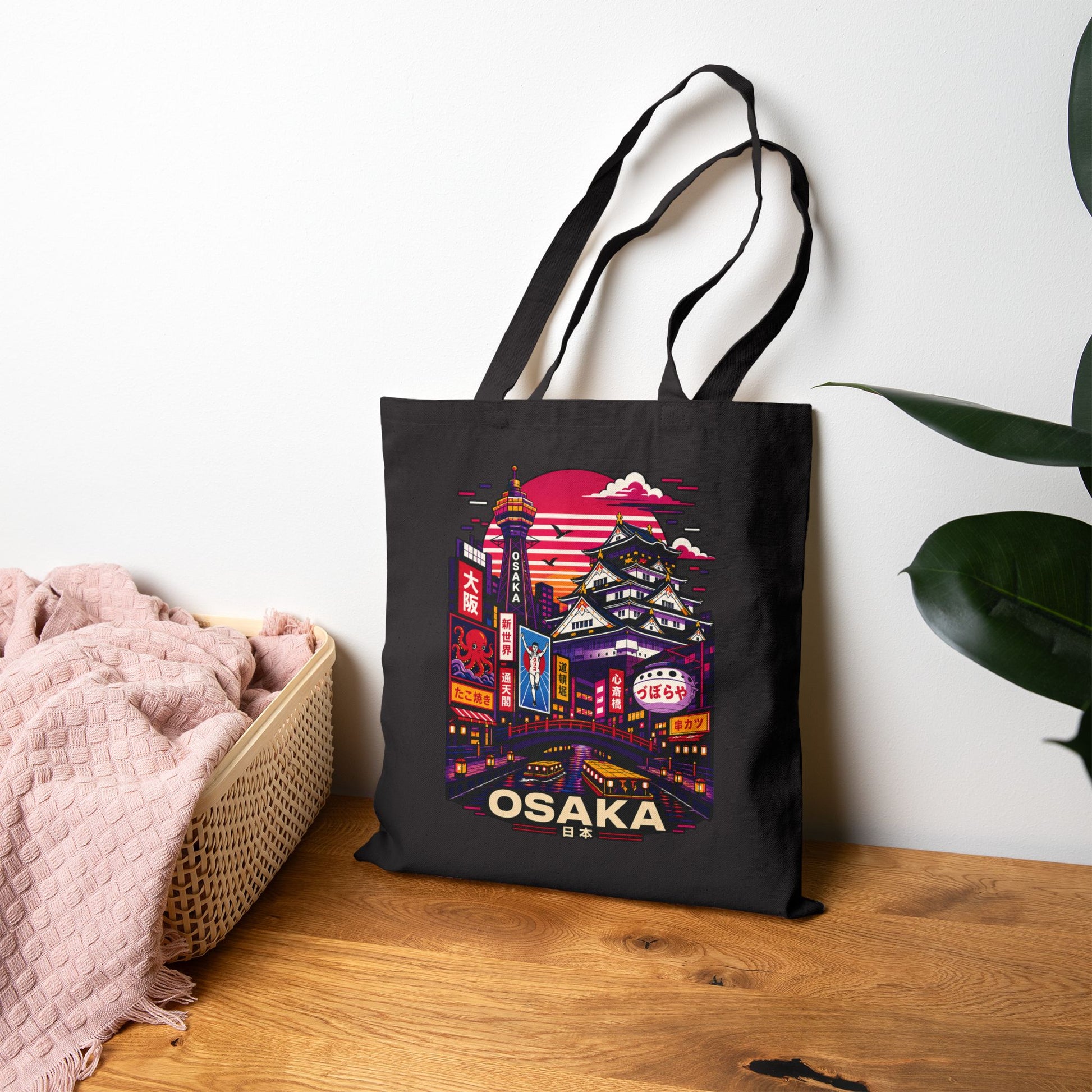 Black tote bag with Osaka skyline and neon-style sign graphic on front