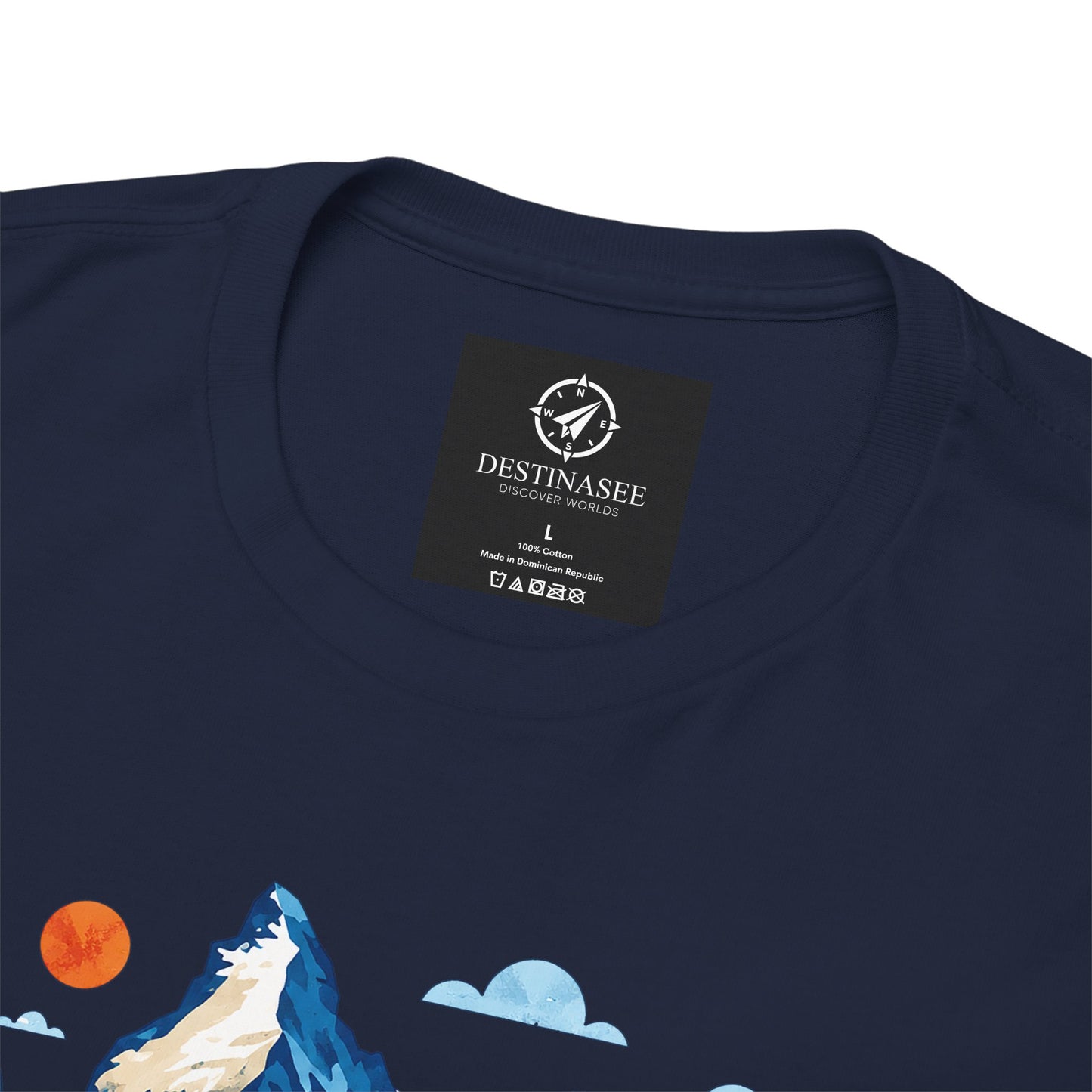 Navy T-shirt neckline with black brand label and partial mountain village print