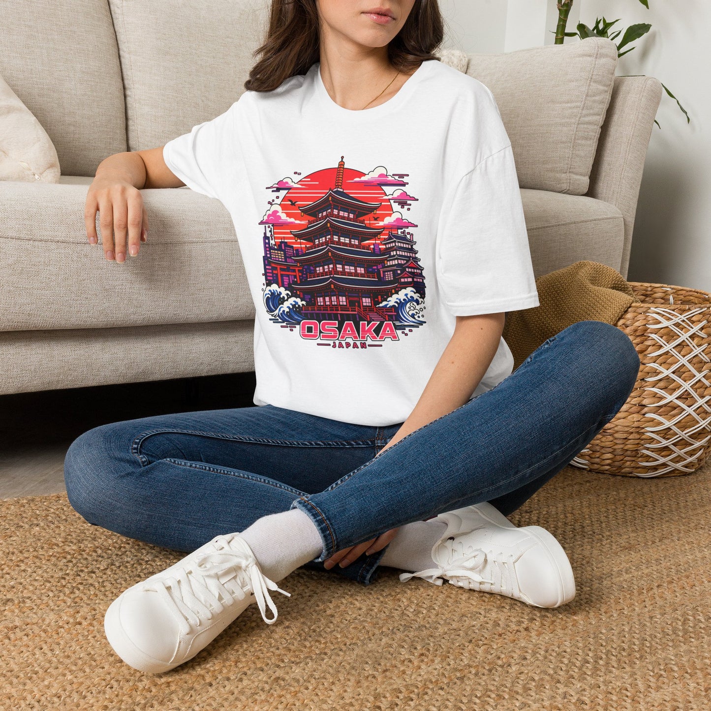 White T-shirt with Osaka graphic print, worn by a person sitting.