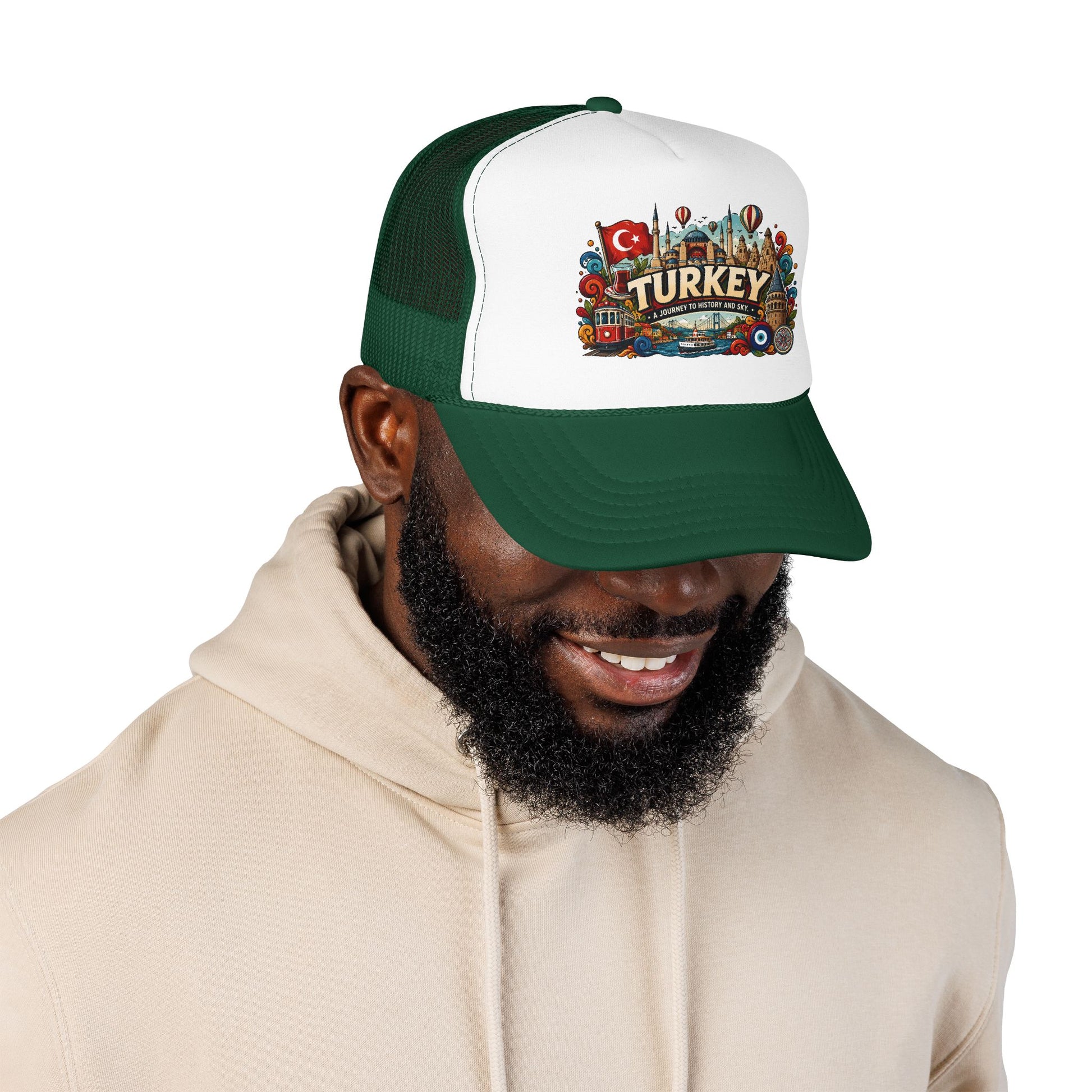 Dark green and white trucker hat worn on a person, front Turkey emblem patch visible