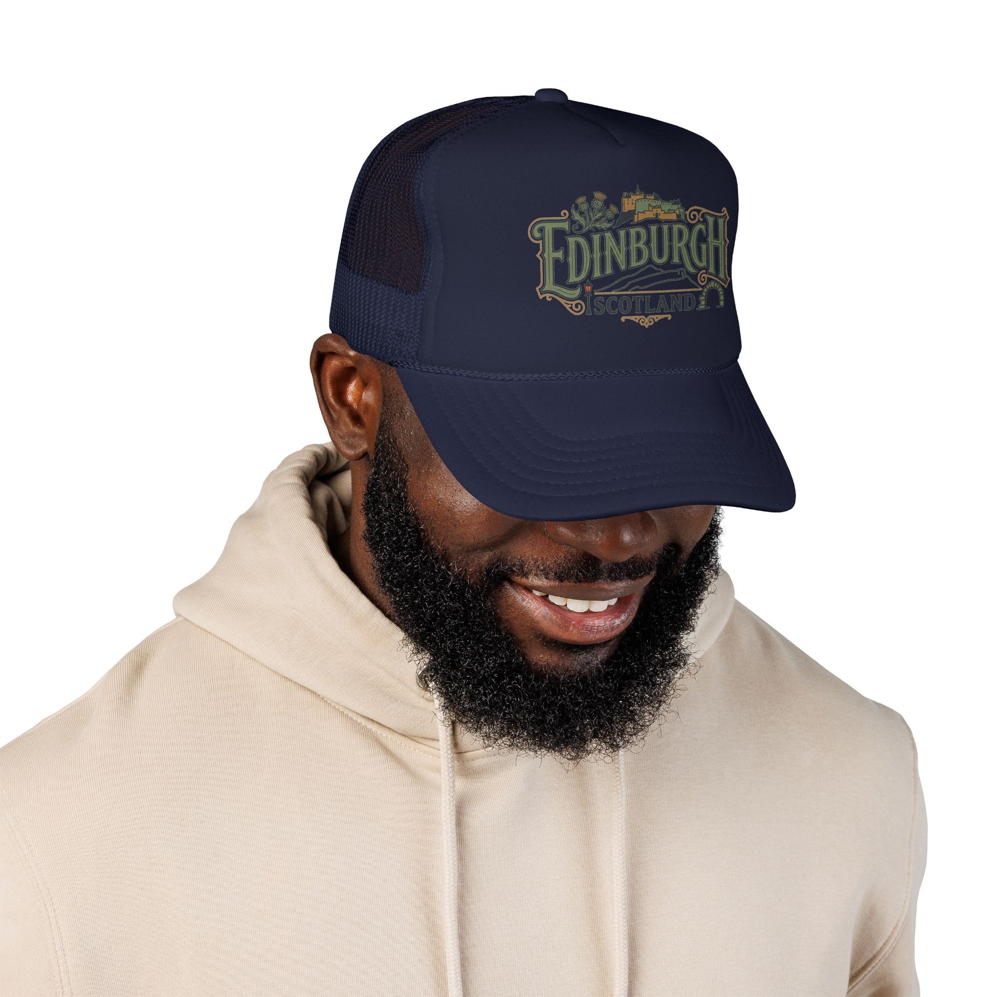 Navy trucker hat with mesh side panels and embroidered Edinburgh logo on the front.