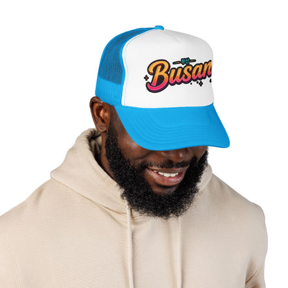 Blue and white trucker hat with 'Busan' logo on front panel