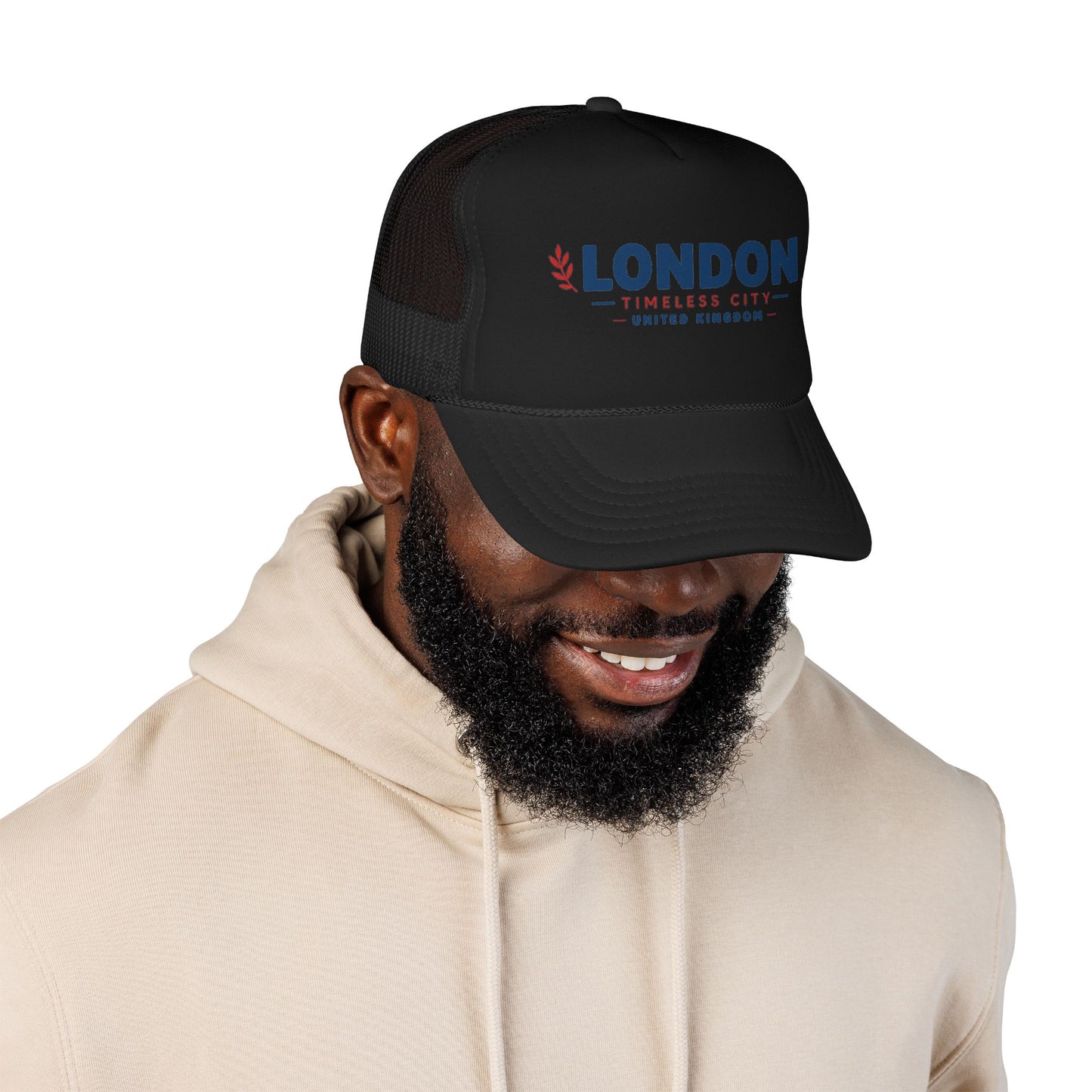 Black foam trucker hat with mesh back and blue “LONDON” logo on front panel