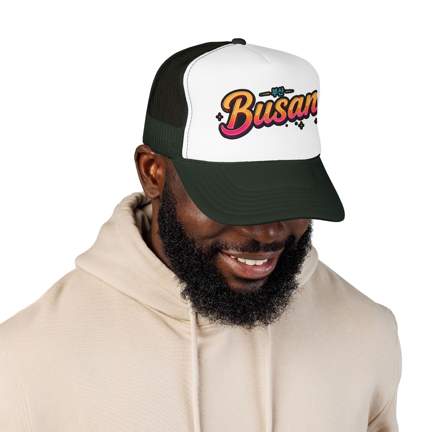 Dark green and white trucker hat with 'Busan' logo on front panel