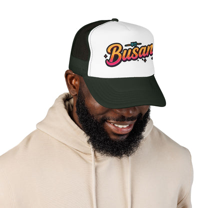 Dark green and white trucker hat with 'Busan' logo on front panel