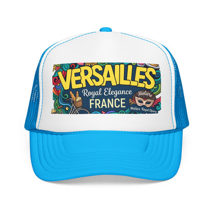 Blue and white trucker hat with mesh side panels and colorful 'Versailles France' front patch