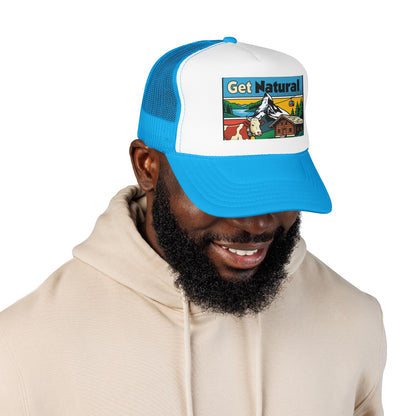 Trucker hat with white front panel, bright blue mesh back, blue brim, and Get Natural patch