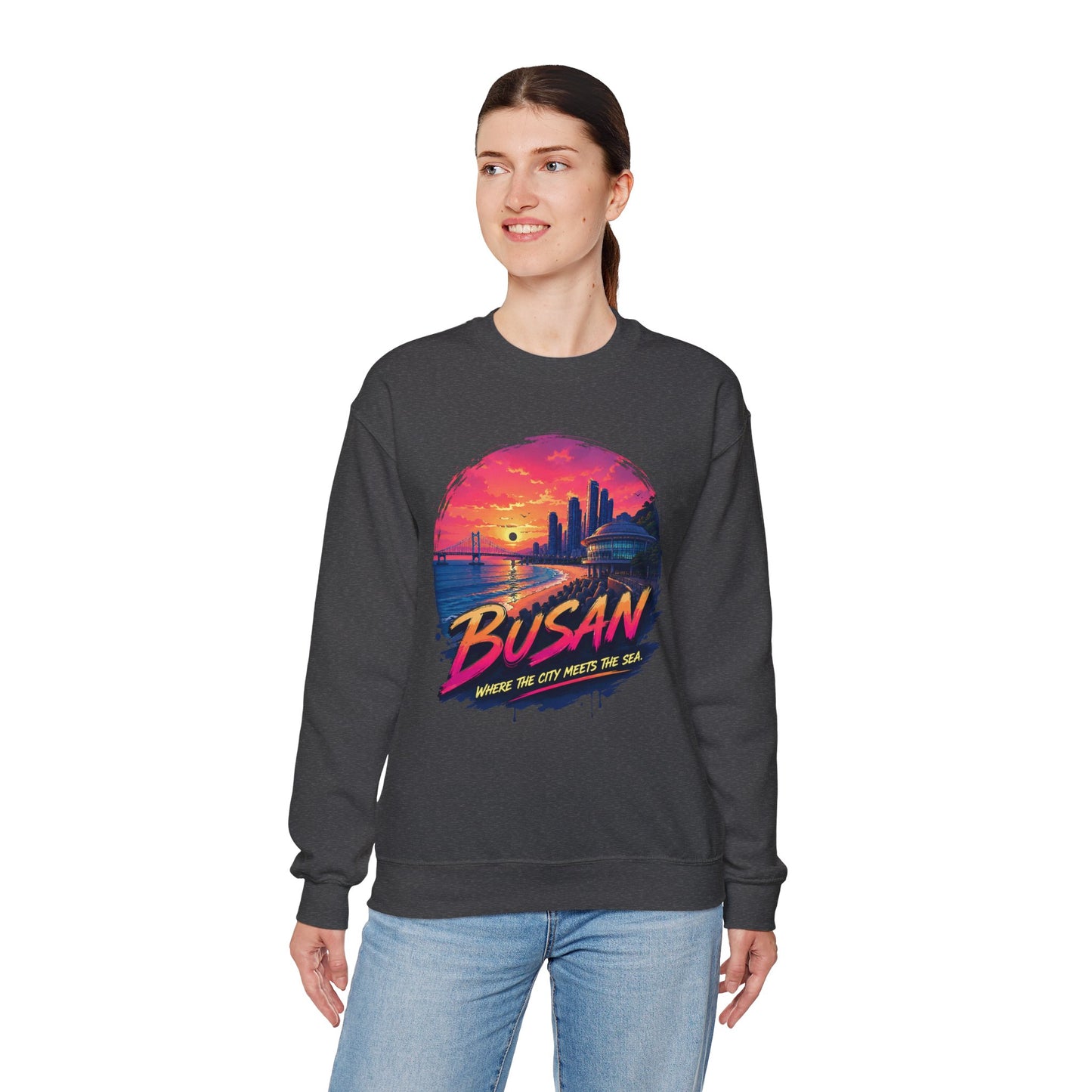 Dark charcoal crewneck sweatshirt with Busan sunrise city graphic on the chest.