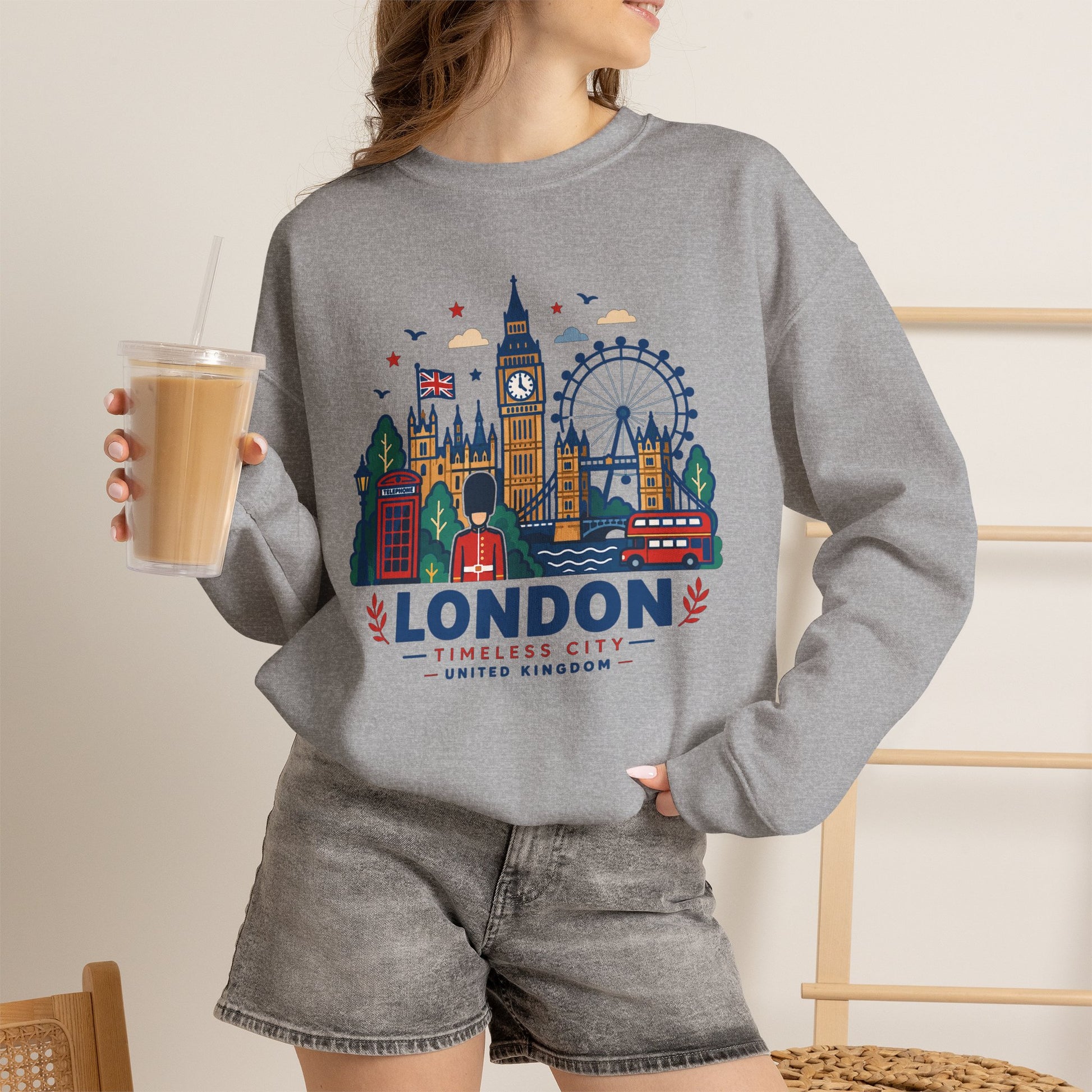 Grey crewneck sweatshirt with colorful London skyline graphic and “London” logo