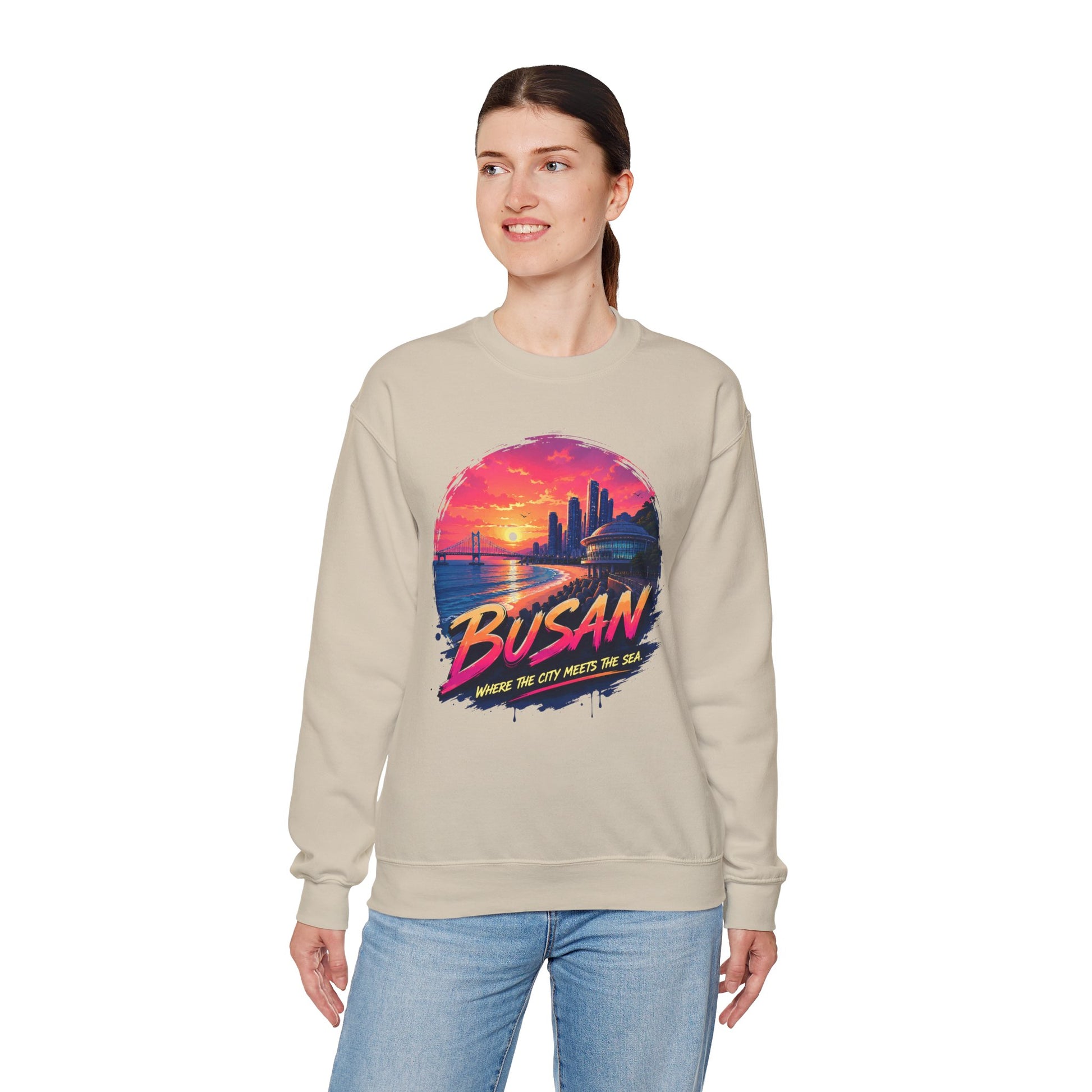 Light beige crewneck sweatshirt with Busan sunrise city graphic on the chest.