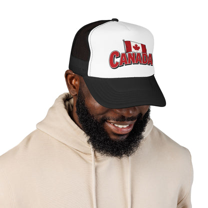 Black and white trucker hat with Canada flag patch and red “CANADA” logo on front.