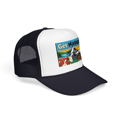 Black and white trucker hat with a front alpine scene graphic patch and mesh back.