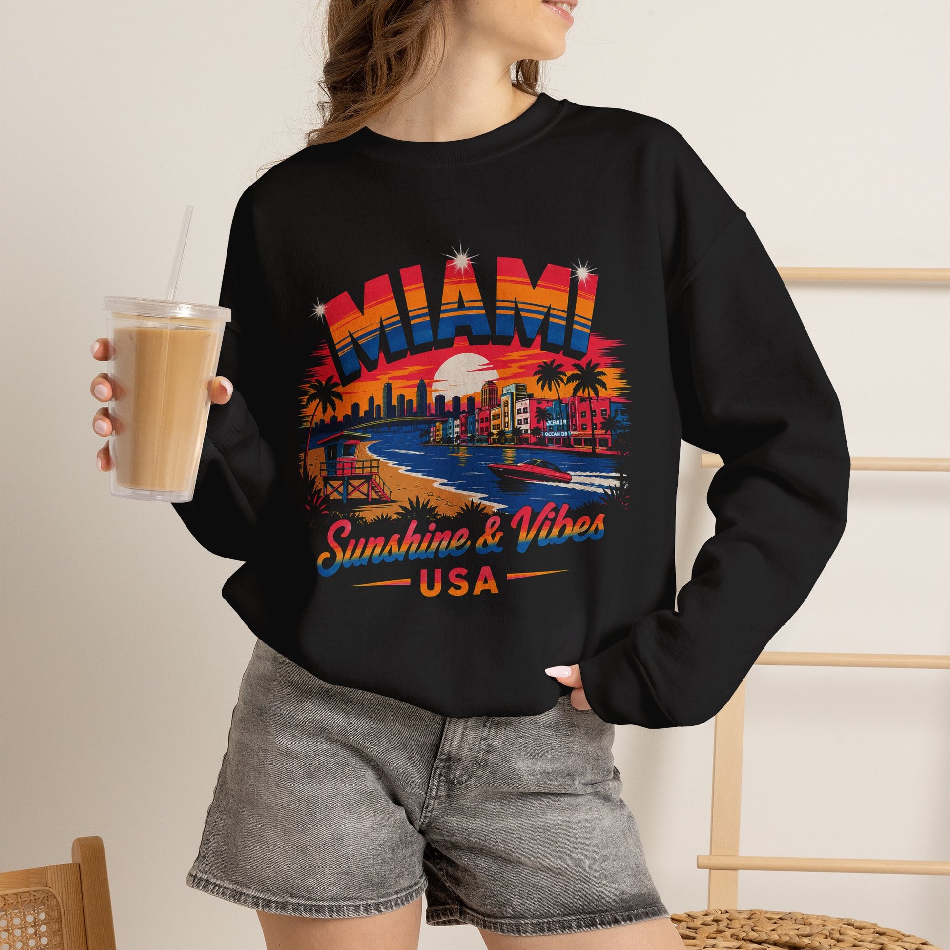 Black crewneck sweatshirt with Miami skyline graphic and Sunshine & Vibes USA print