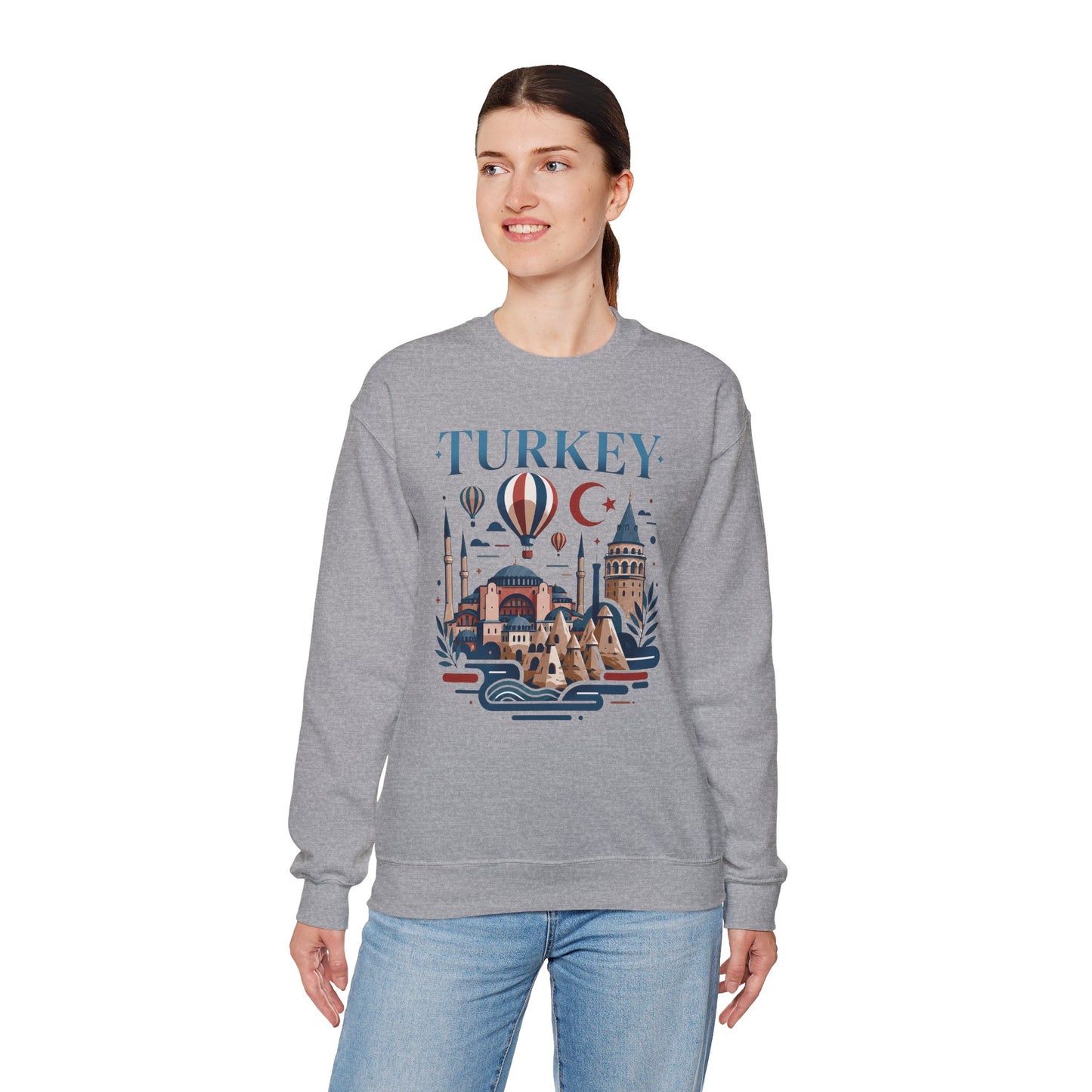Heather gray crewneck sweatshirt with colorful Turkey skyline graphic on the front, worn by model.