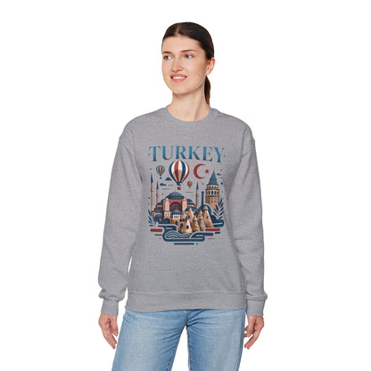 Heather gray crewneck sweatshirt with colorful Turkey skyline graphic on the front, worn by model.