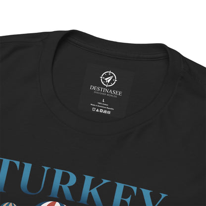 Black T-shirt neckline with small brand label and partial blue Turkey graphic