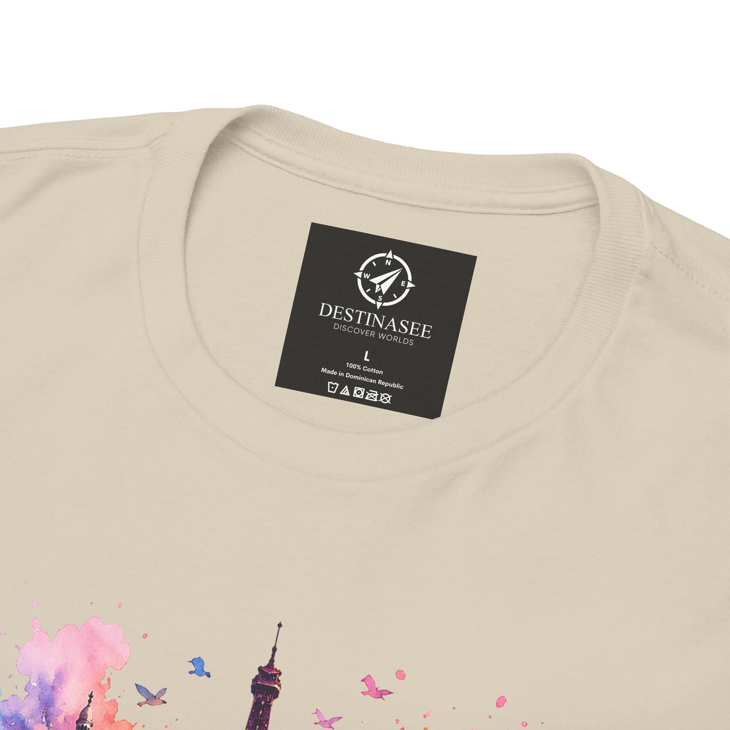 Natural/beige T-shirt back close-up with neck label and partial floral Eiffel Tower artwork