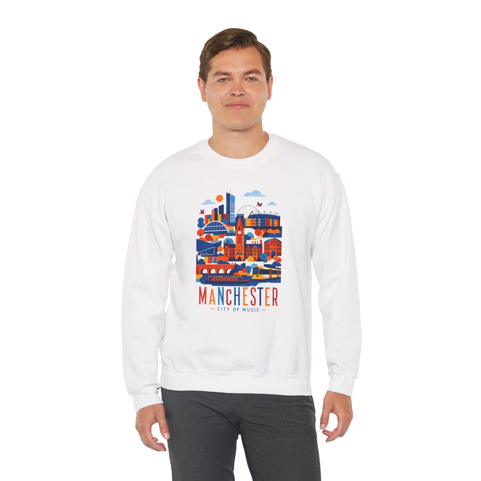 White crewneck sweatshirt with colorful Manchester cityscape graphic on front