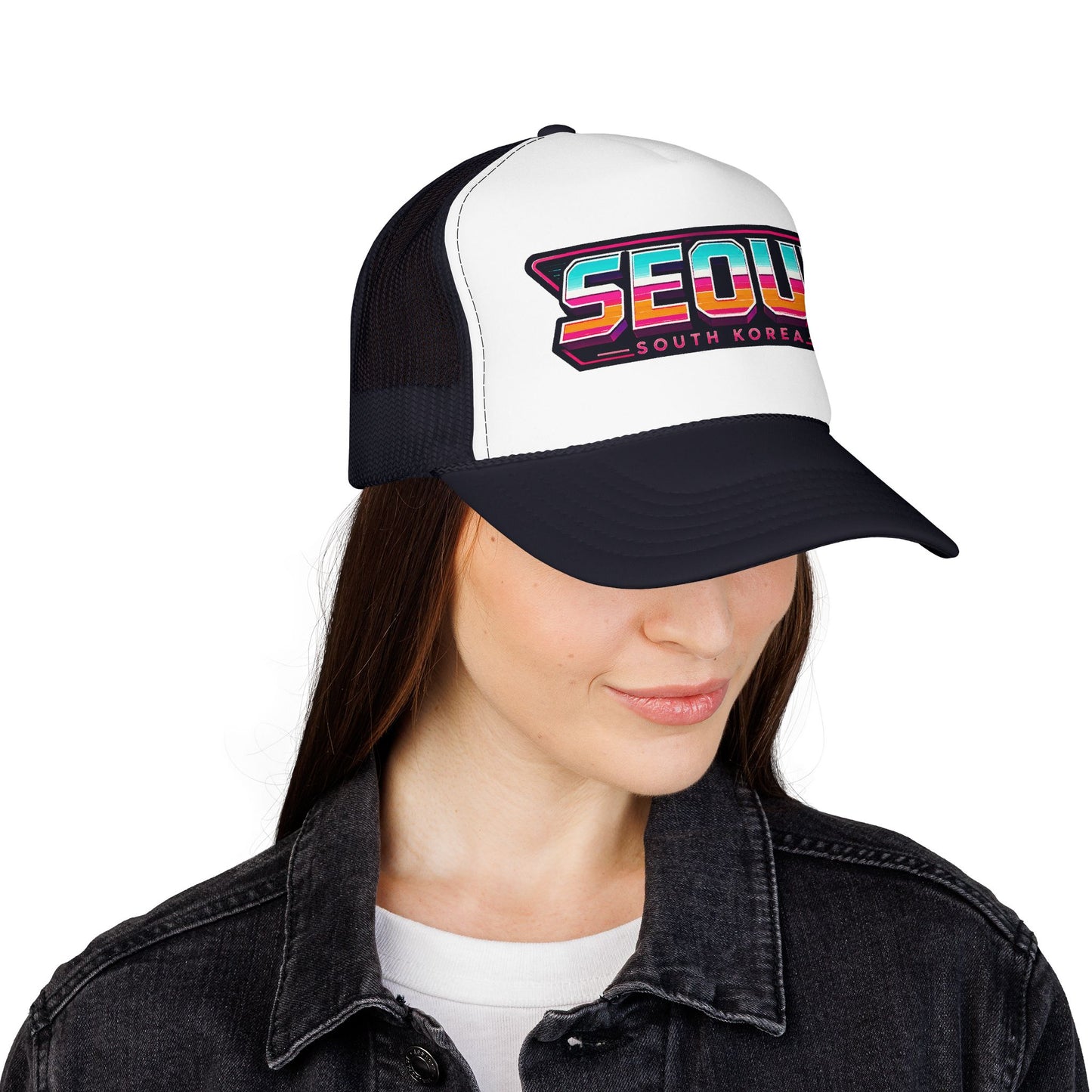Black and white trucker hat worn by woman, front Seoul logo graphic