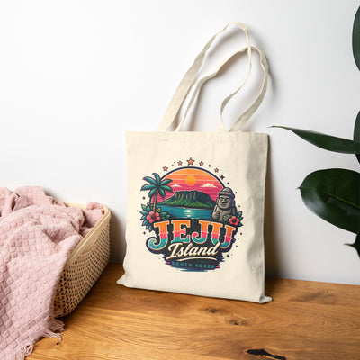 Natural canvas tote bag with colorful Jeju Island graphic and two short handles