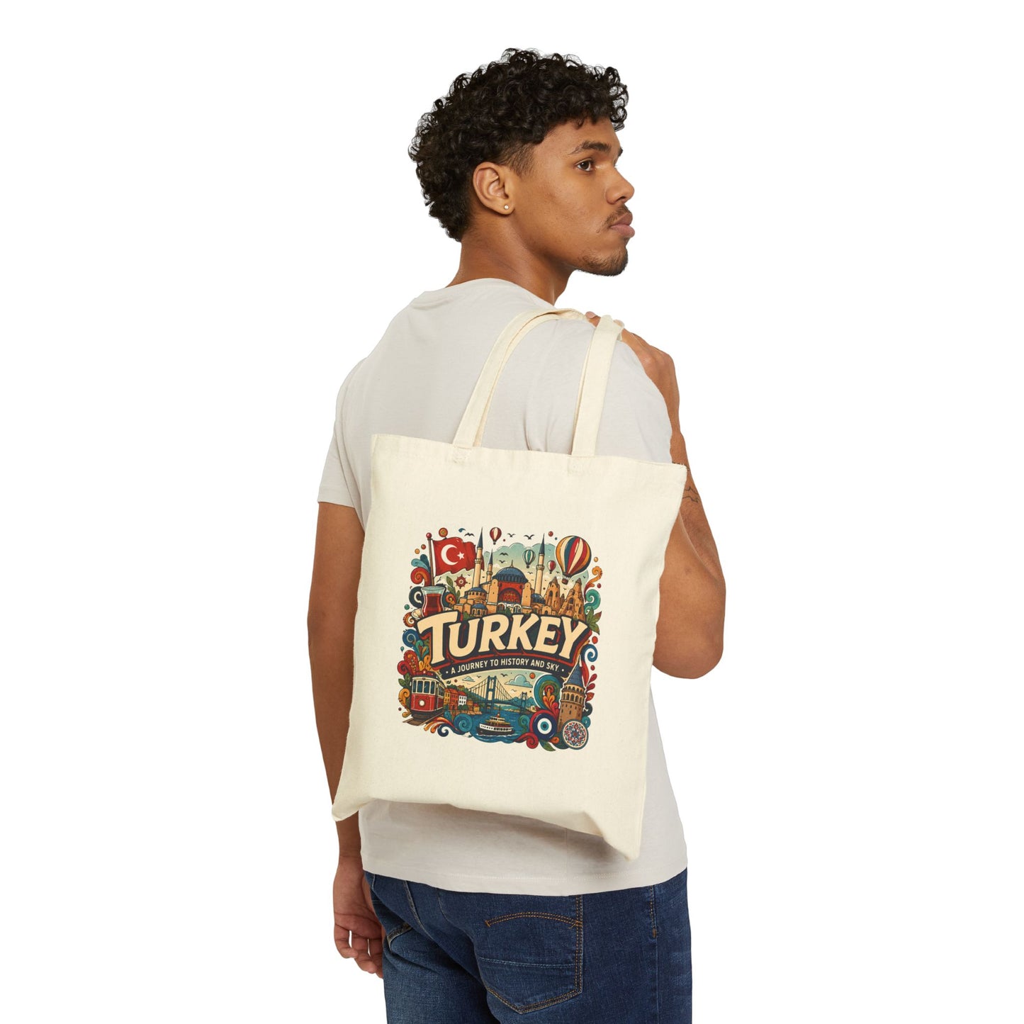 Natural canvas tote bag with colorful Turkey travel graphic, worn on shoulder
