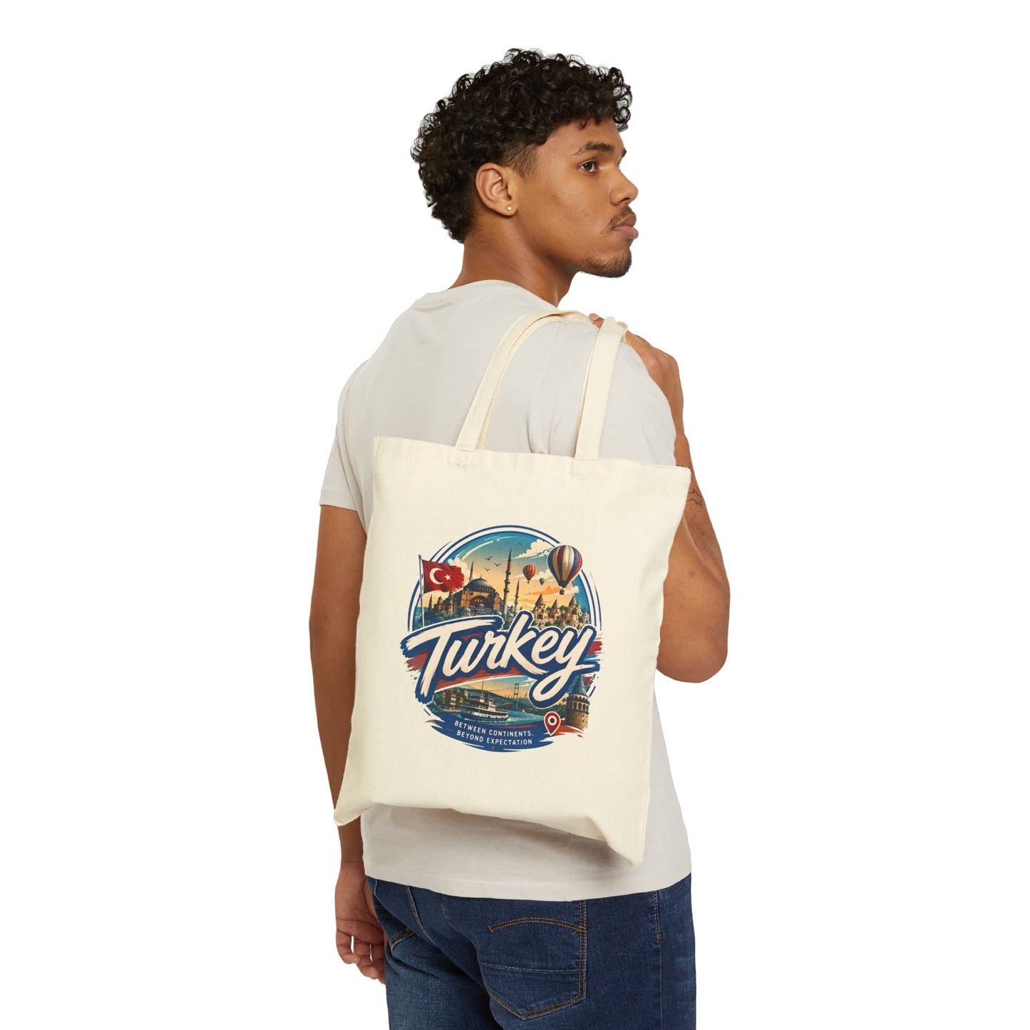 Natural canvas tote bag with Turkey graphic, worn over shoulder