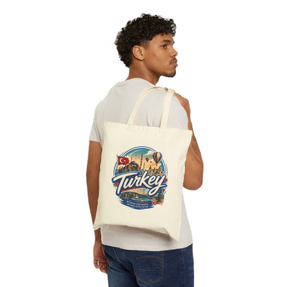 Natural canvas tote bag with Turkey graphic, worn over shoulder