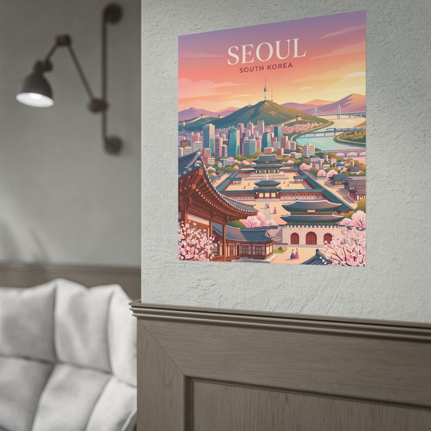 Seoul cityscape rolled poster on a wall, showing SEOUl title, palace courtyard, and blossoms