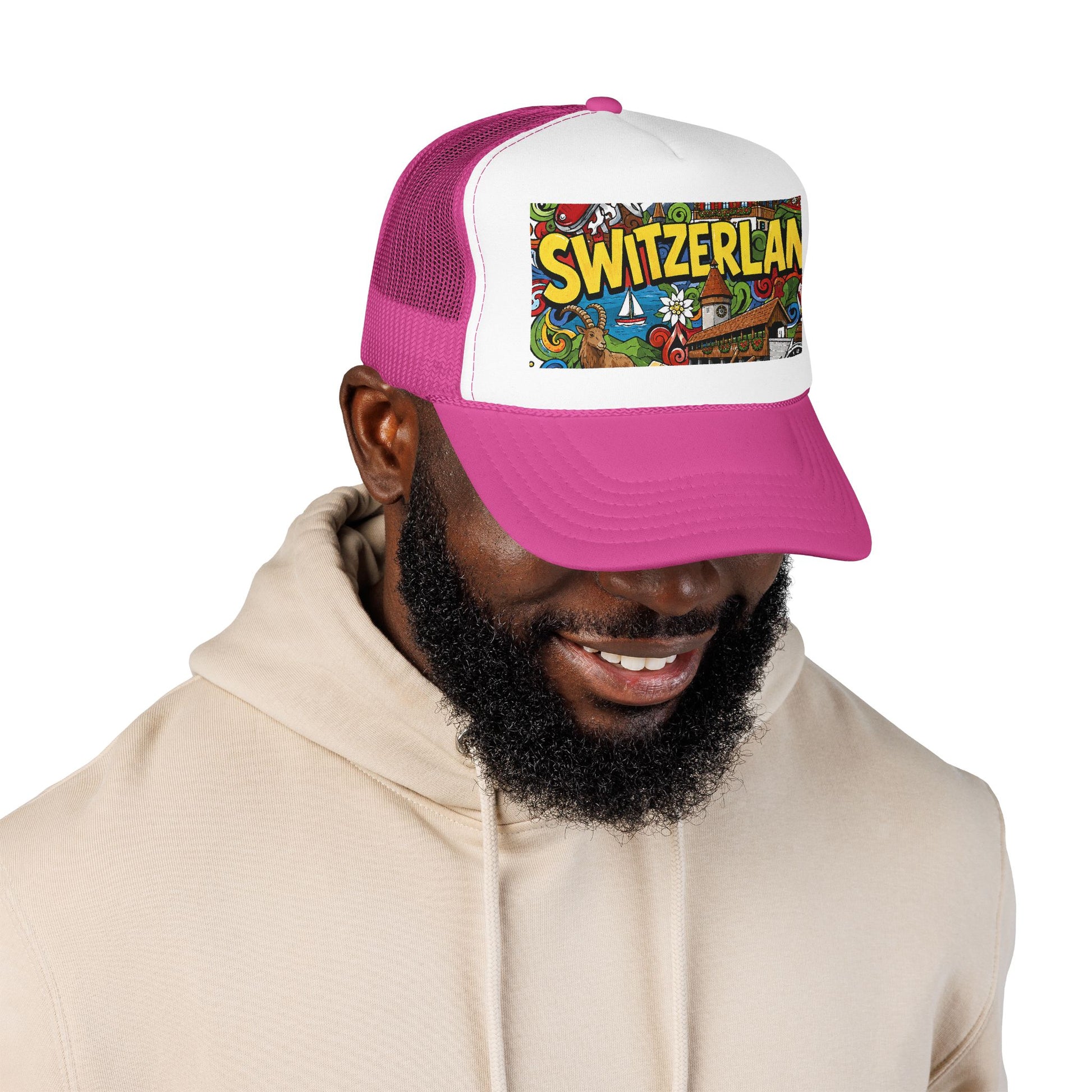 Pink and white trucker hat with colorful Switzerland graphic patch, worn on head.