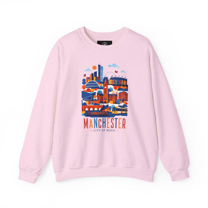 Light pink crewneck sweatshirt front with cityscape graphic and Manchester text
