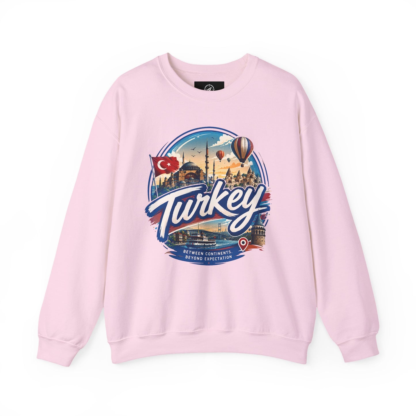 Light pink crewneck sweatshirt with Turkey graphic, front view, long sleeves