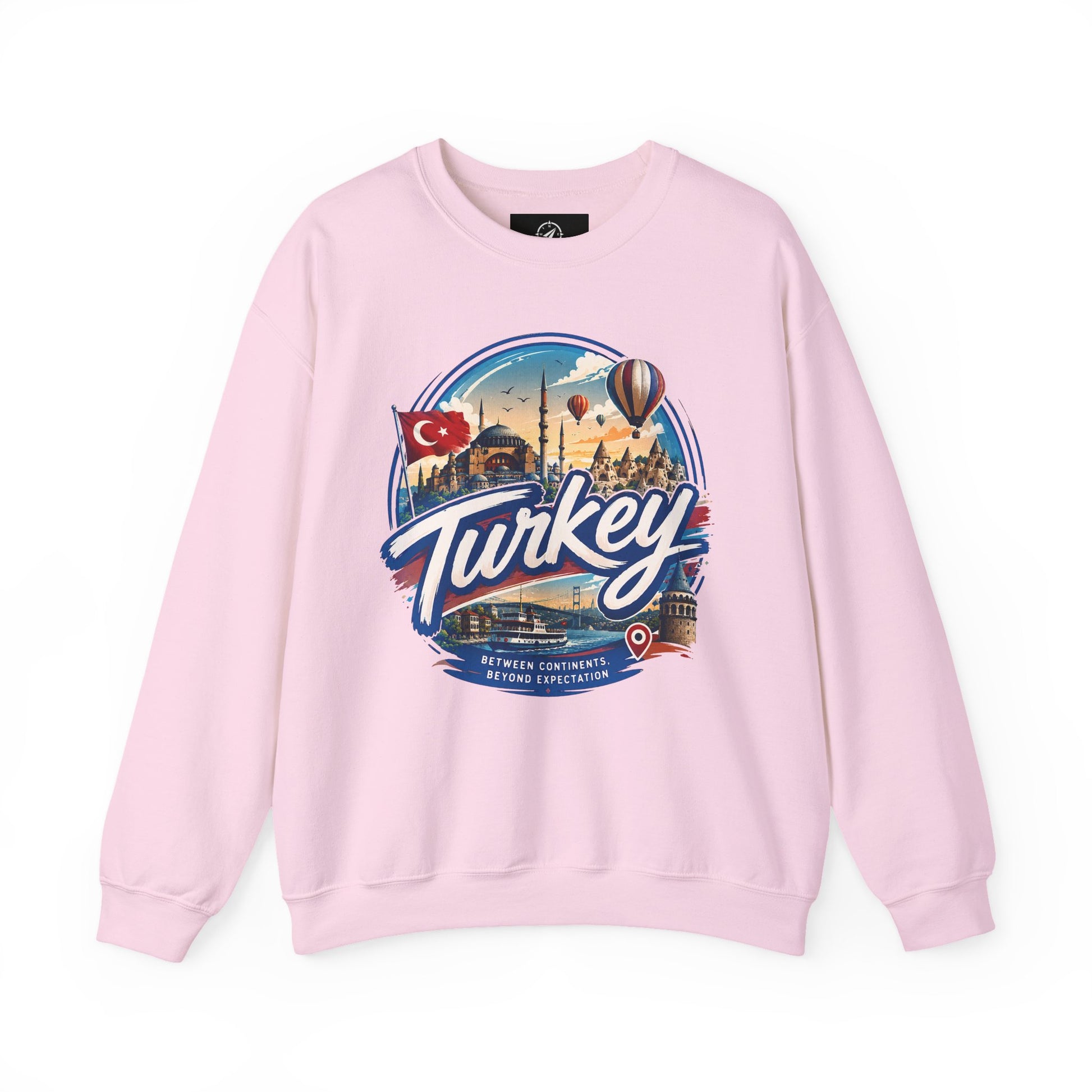 Light pink crewneck sweatshirt with Turkey graphic, front view, long sleeves