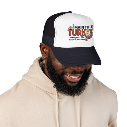Black and white trucker hat on a man, mesh back and curved brim with Turkey logo.