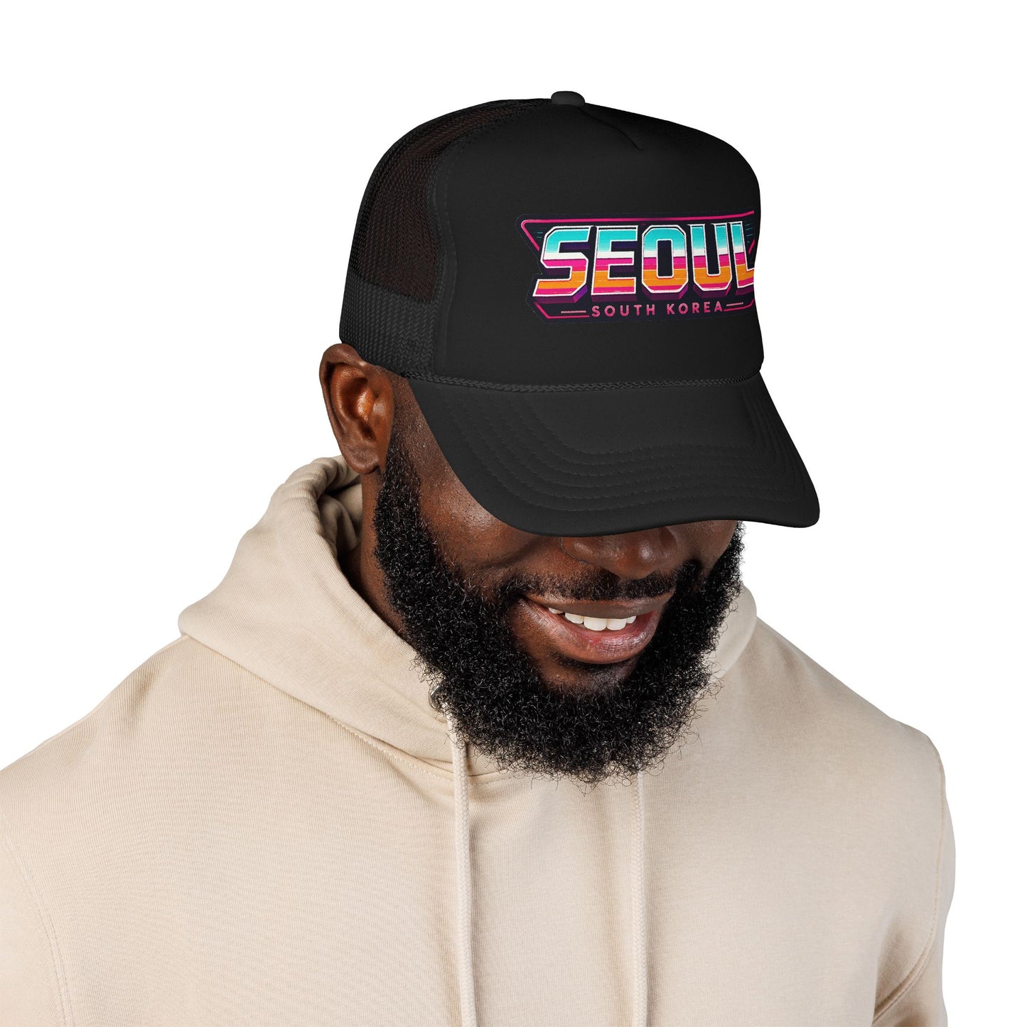 Black trucker hat worn by model; embroidered “SEOUL SOUTH KOREA” patch logo