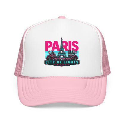 Light pink trucker hat with pink mesh sides and Paris City of Lights graphic, curved brim.