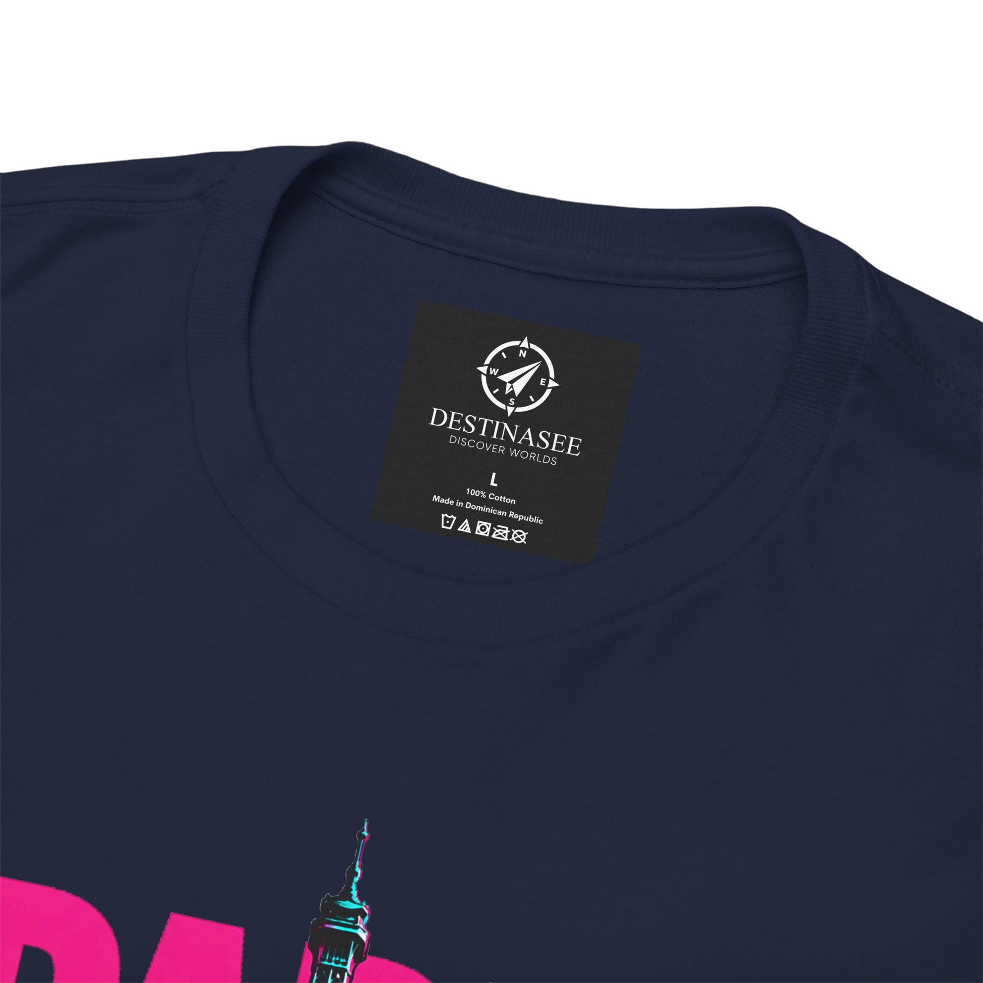 Navy T-shirt close-up: chest logo tag and partial Eiffel Tower neon-style print