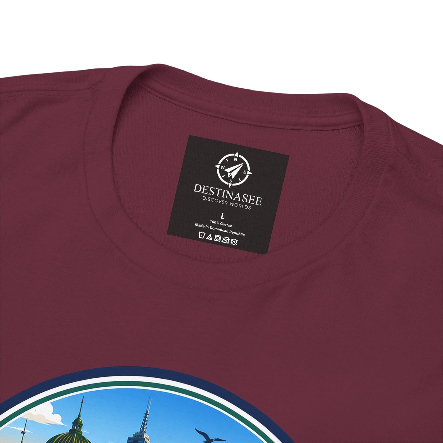Maroon crewneck travel tee with small square brand tag and city graphic