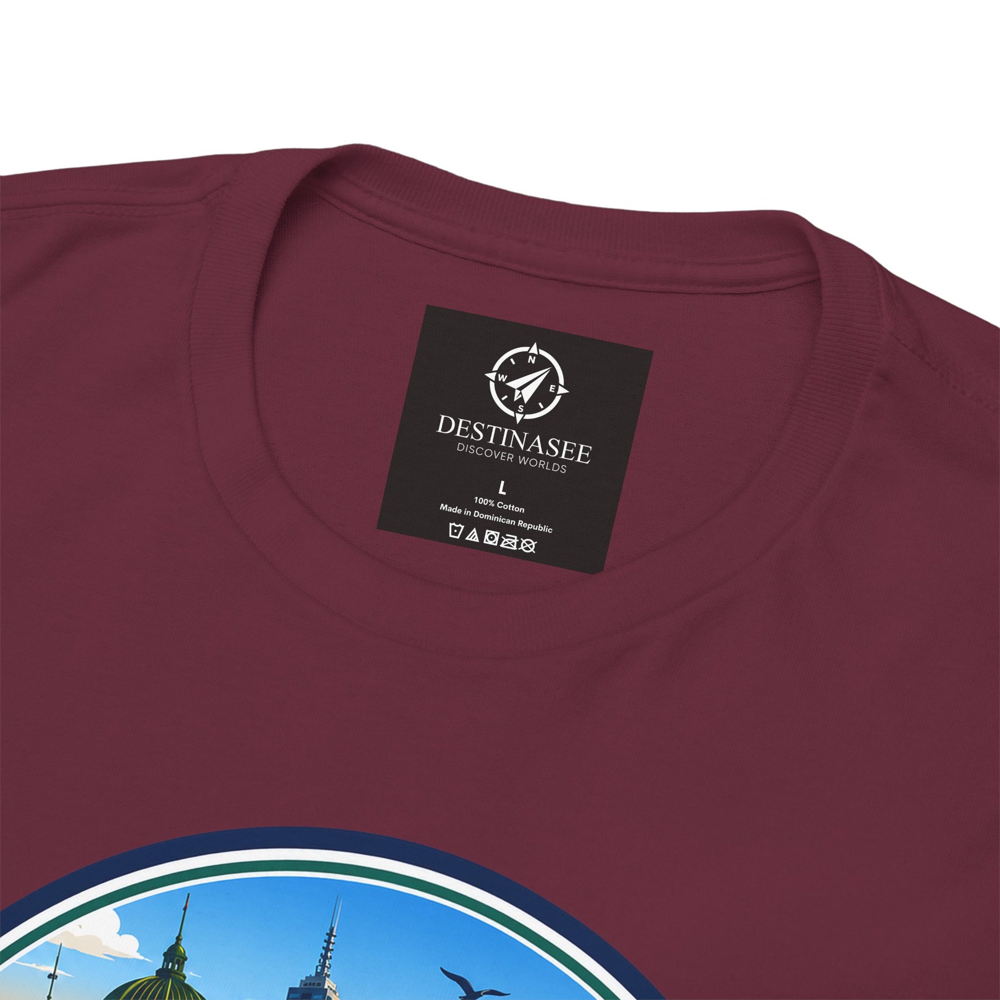 Maroon crewneck travel tee with small square brand tag and city graphic