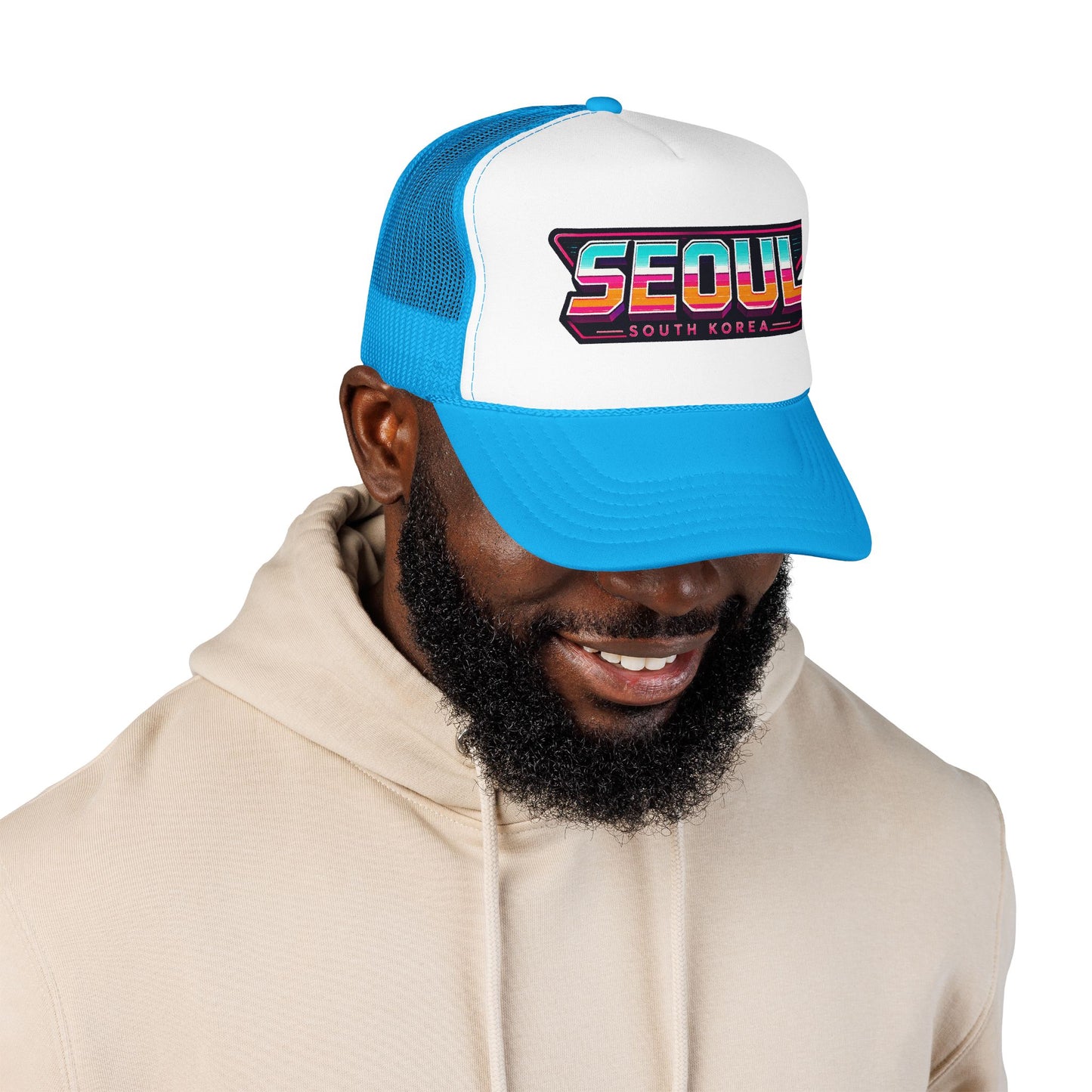 Blue and white trucker hat with “SEOUL South Korea” logo patch, worn by model