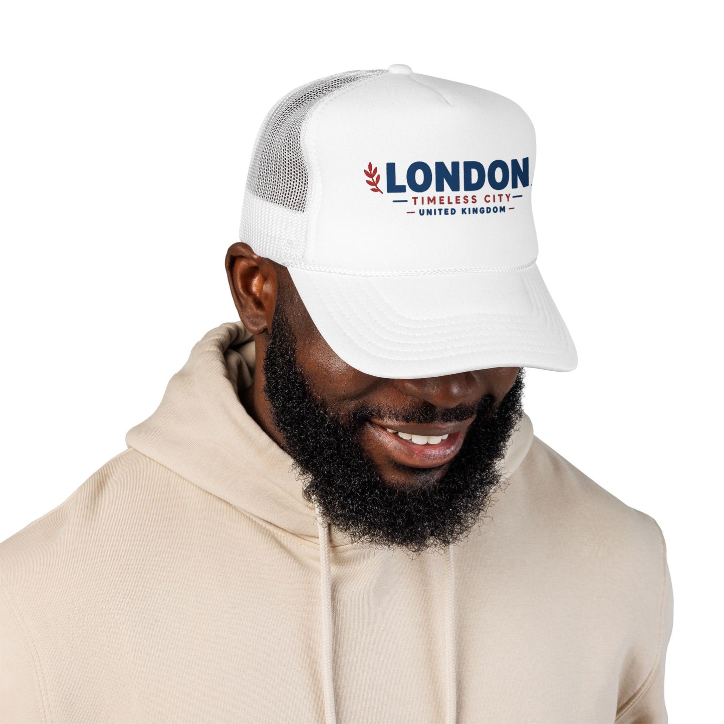 London Timbers trucker hat with white front and white mesh panels, LONDON logo on model.