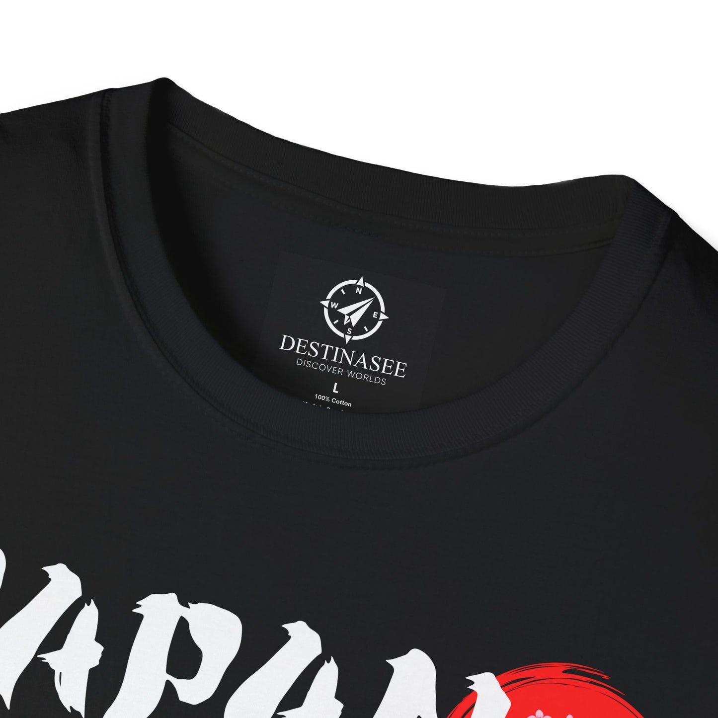 Close-up black T-shirt neckline with small chest logo and partial “Japan” graphic