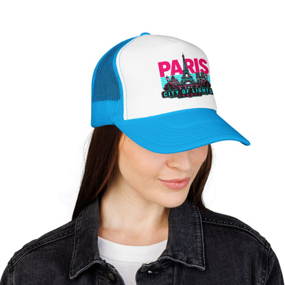 Blue and white mesh trucker hat with “PARIS City of Lights” front graphic patch.