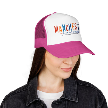 Manchester City trucker hat on model, white front logo, magenta mesh, curved brim