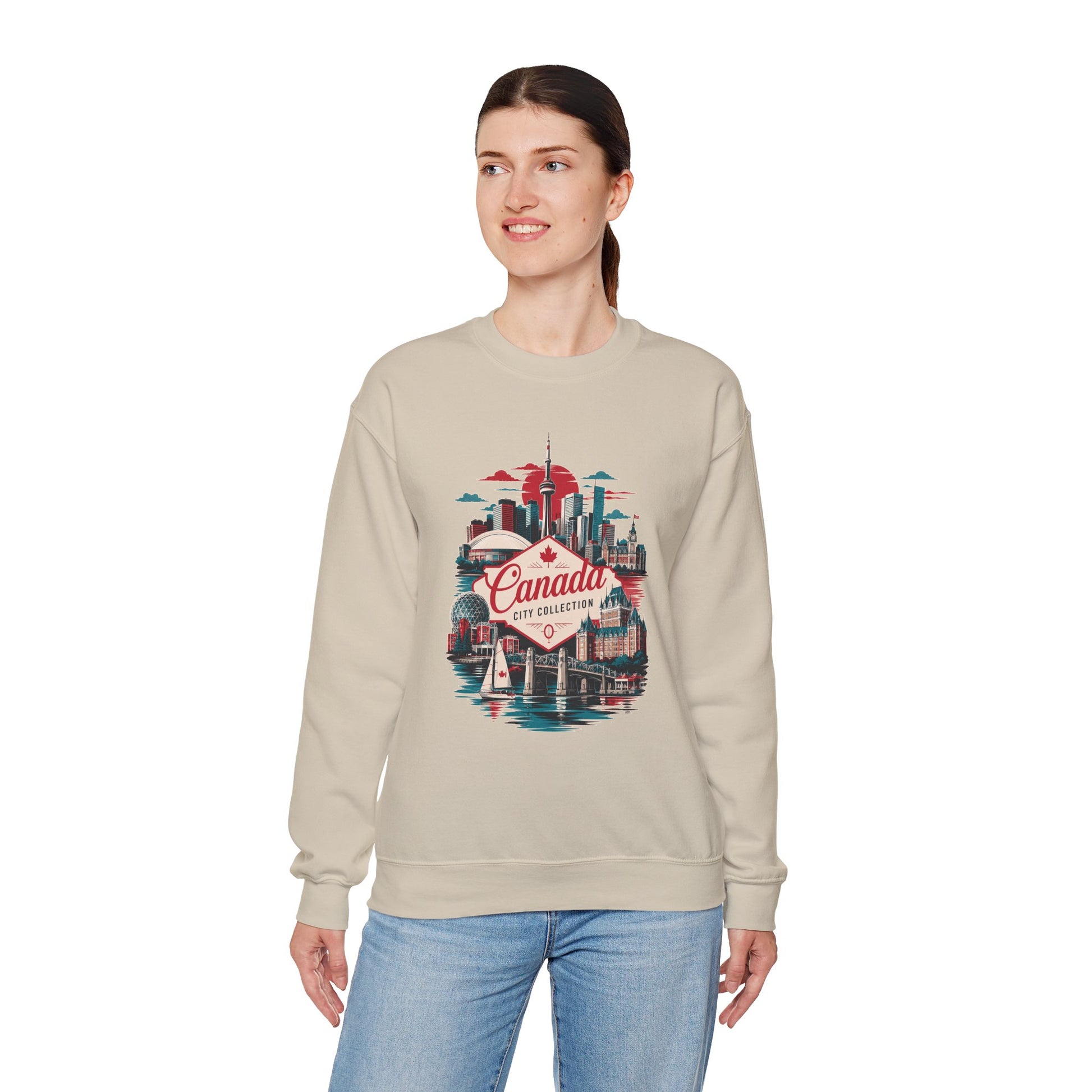 Sand/beige crewneck sweatshirt with multicolor Toronto Canada graphic on front.