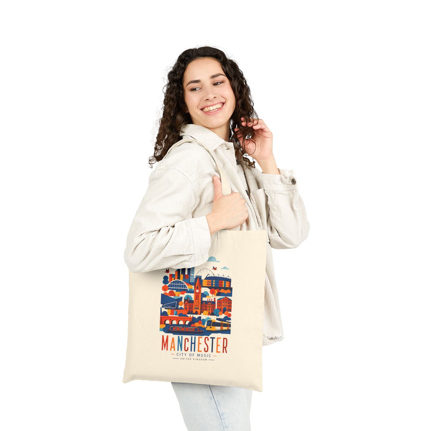 Natural cotton tote bag with long handles and Manchester skyline graphic front.