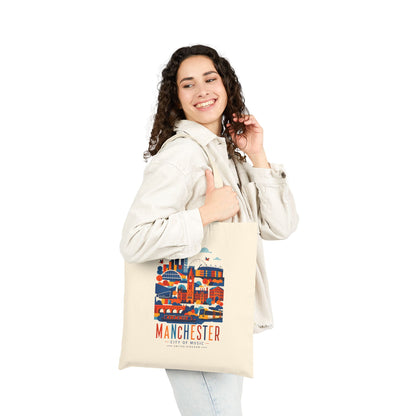 Natural cotton tote bag with long handles and Manchester skyline graphic front.