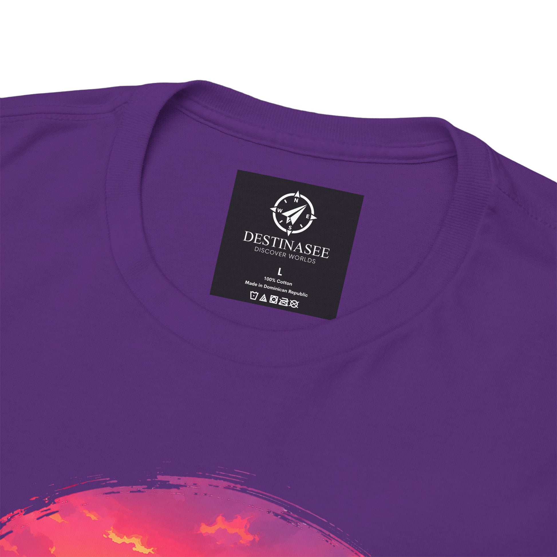 Purple T-shirt close-up: neckline label and Busan sunset graphic detail on chest.