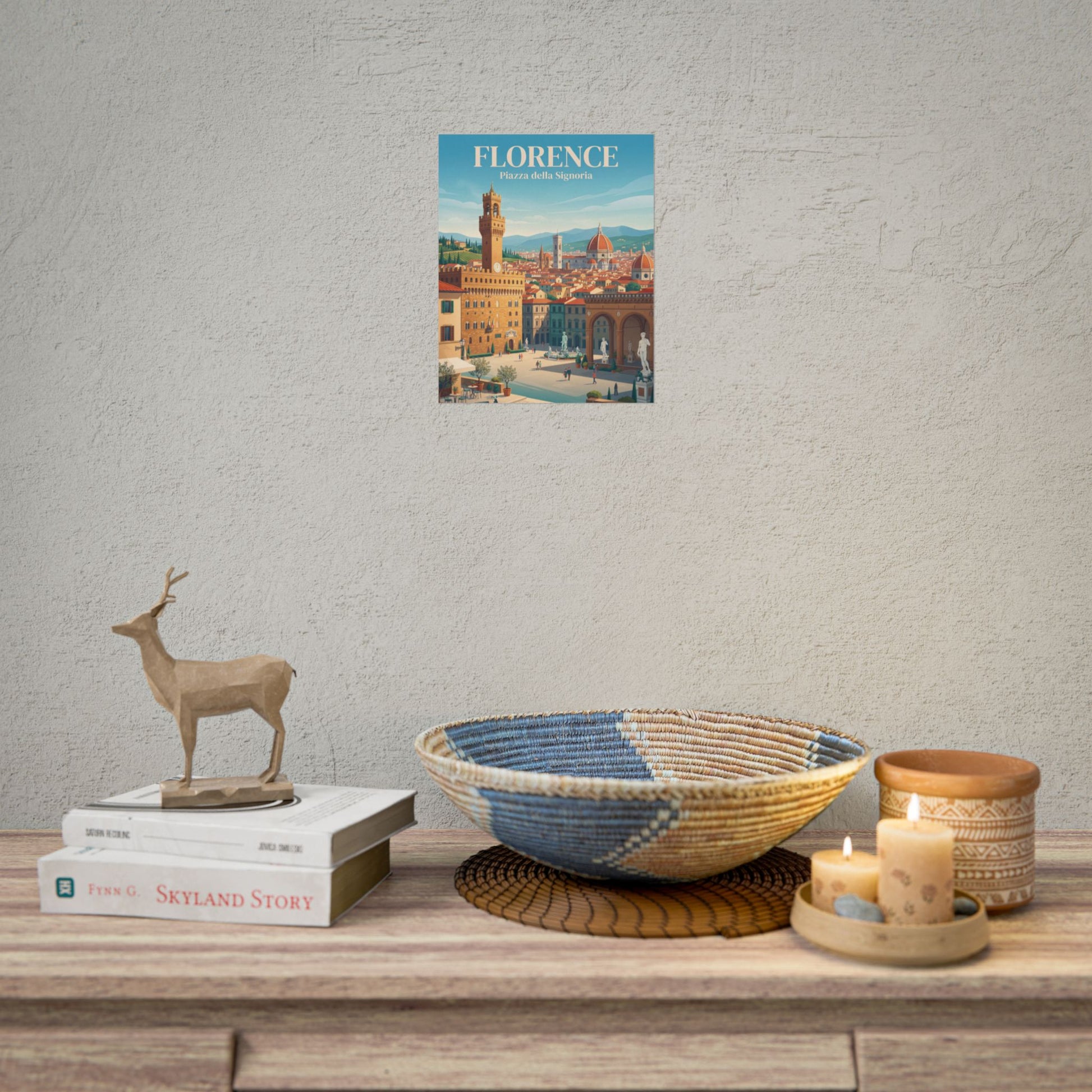 Florence rolled poster shown on wall above decor: blue cityscape with “Piazza della Signoria”.