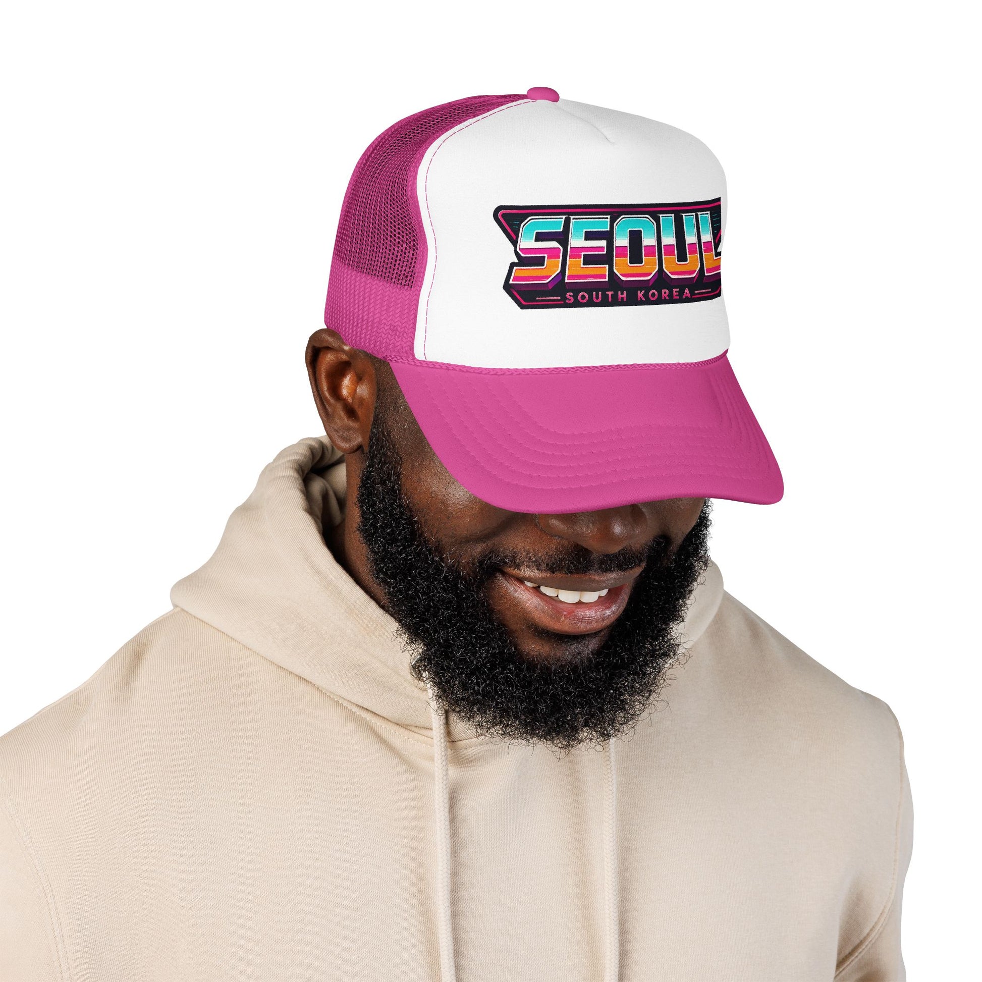 White and magenta trucker hat worn by model; “SEOUL SOUTH KOREA” patch logo